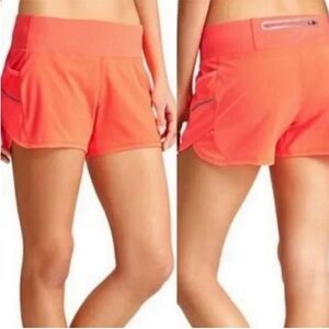 Athleta Women’s “Ready Set Go” Running Short Size Medium - Orange - Lined